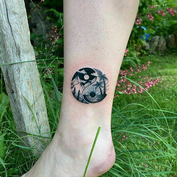 Mountains and sea yin yang tattoo