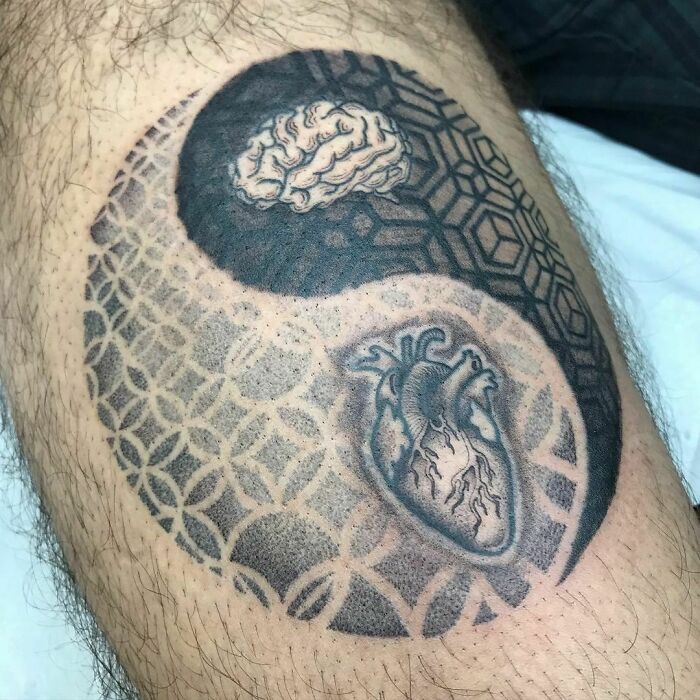 Brain and heart forming yin yang symbol Tattoo