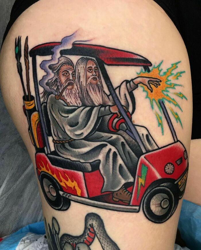 Gandalf and Saruman driving a golf car tattoo