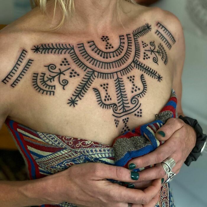 Tribal Tattoo On The Chest