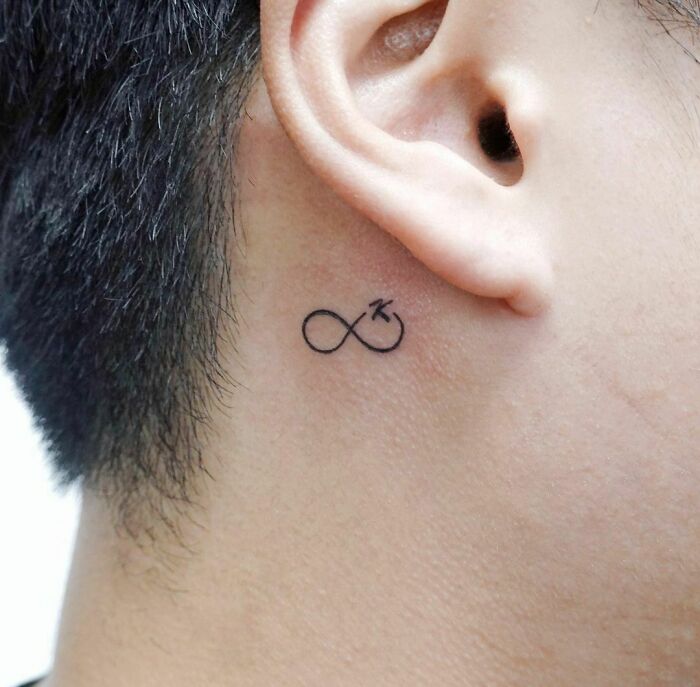 infinity tattoo behind the ear