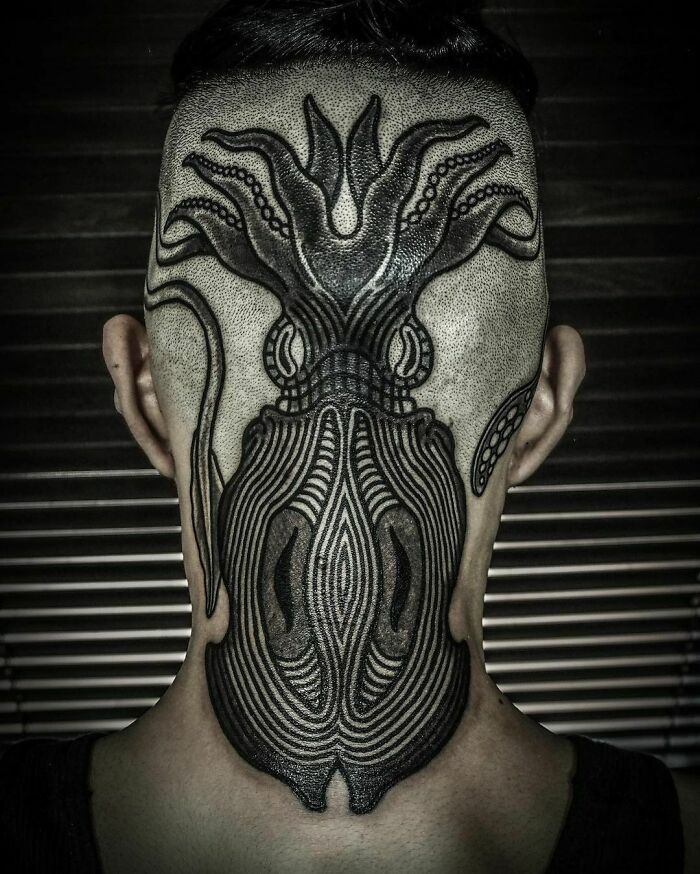 Bold Stylized Octopus back of the head Tattoo