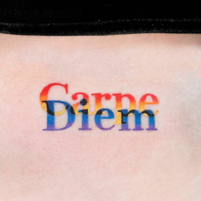 "Carpe Diem" red and blue tattoo 