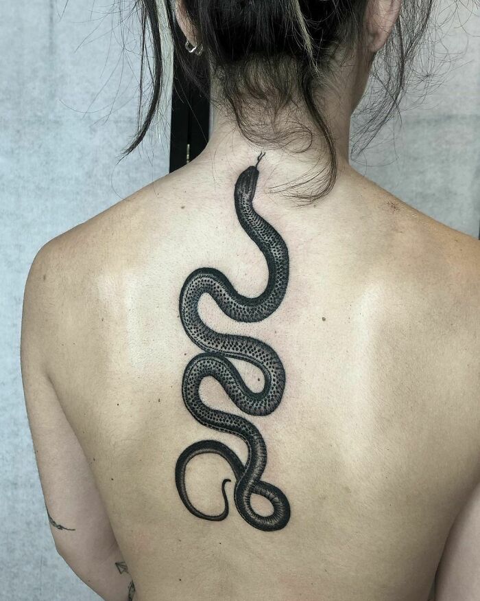 snake back tattoo