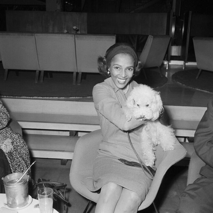 Dorothy Dandridge Cuddling With Her Dog Cissi At Orly Airport In Paris, France, 1962