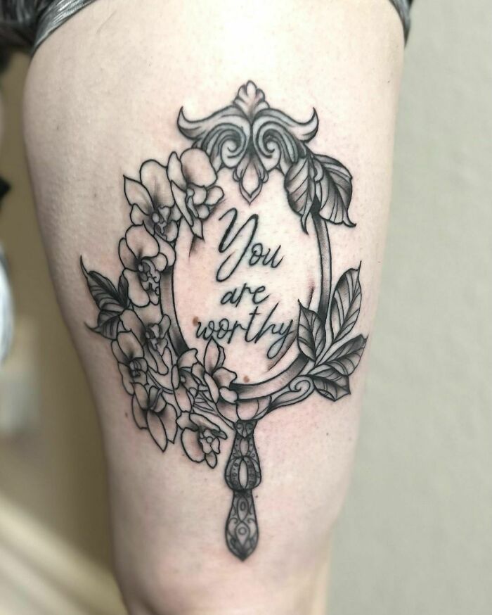 "You Are Worthy" phrase with flowers and leaves tattoo 
