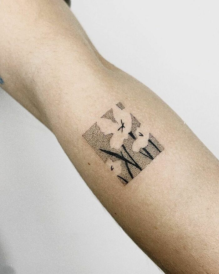 Abstract and small hand Tattoo