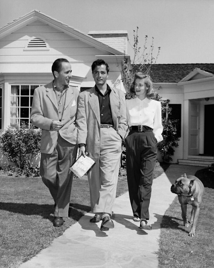 Actor Humphrey Bogart And His Wife, Actress Lauren Bacall, Are Helping John Derek, 22 (Center), Get A Start In Hollywood