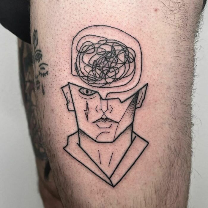 Man with confused mind tattoo 