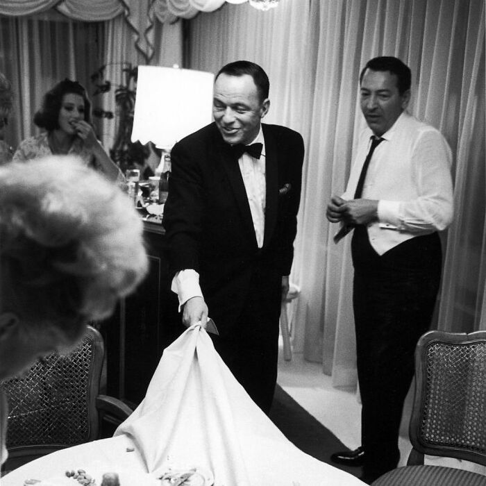 Frank Sinatra Executing A Table Cloth Gag For His Party Guests, 1965. "I’d Never Seen That Trick Really Done. It Worked. I Was Amazed. He Didn’t Spill Any Dishes On The Floor," Said Photographer John Dominis