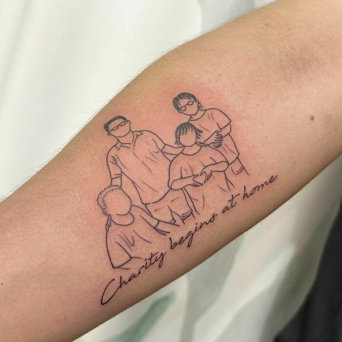 Family graphic arm tattoo with script