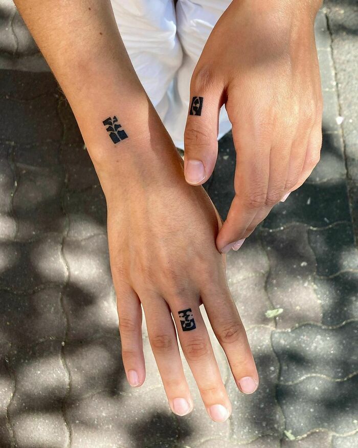 Minimalistic Abstract wrist and finger Tattoos