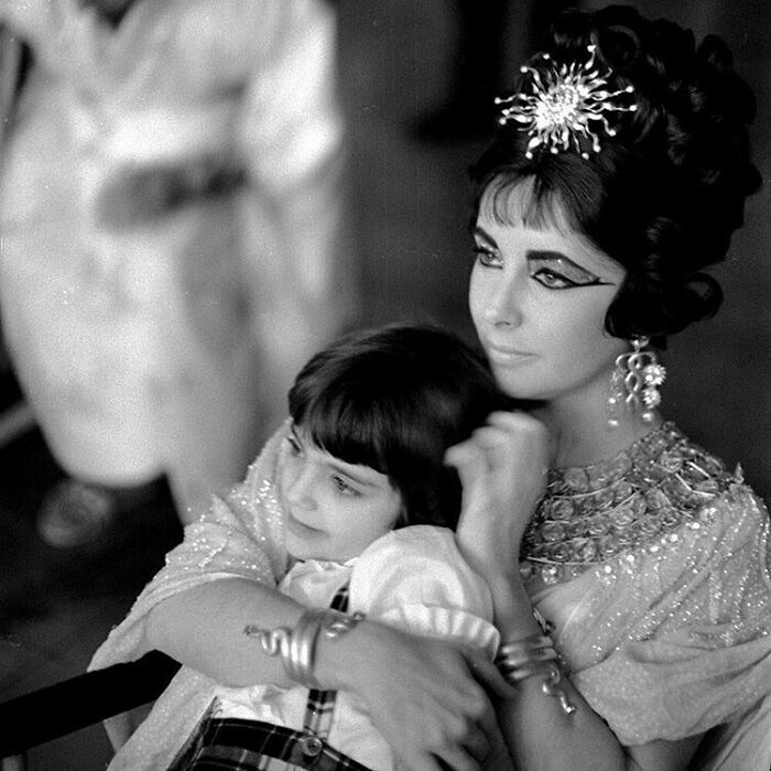 Elizabeth Taylor Receiving A Visit From Her Daughter Liza On The Set Of Cleopatra, 1962. Photos By Paul Schutzer