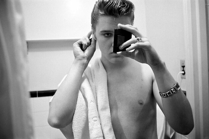 Elvis Presley Getting Ready In His Bathroom At The Warwick Hotel, New York, 1956
