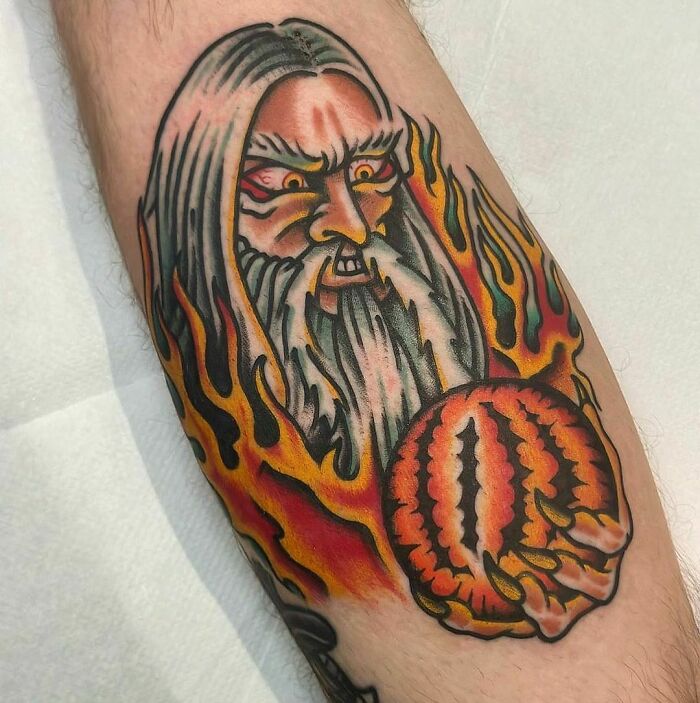 Saruman holding Palantír tattoo 