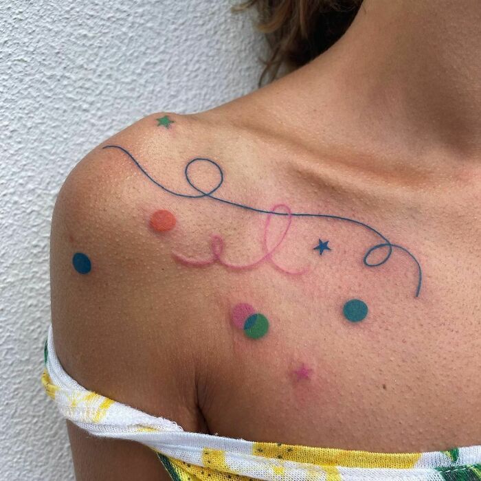 Abstract and colorful shoulder Tattoo 