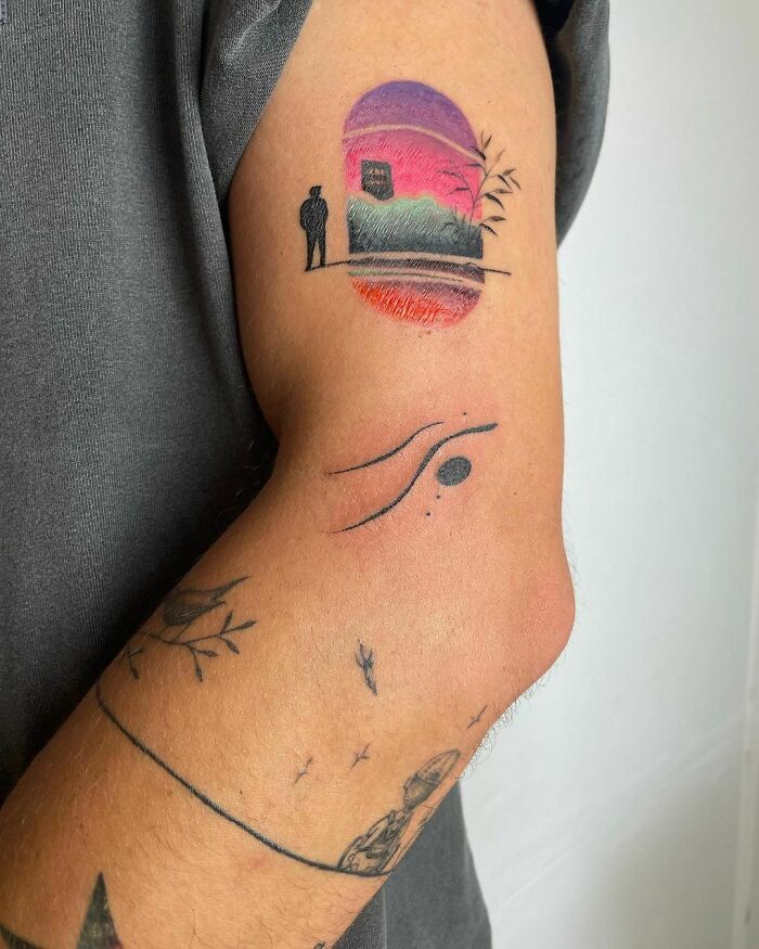 Abstract and colorful hand tattoo 
