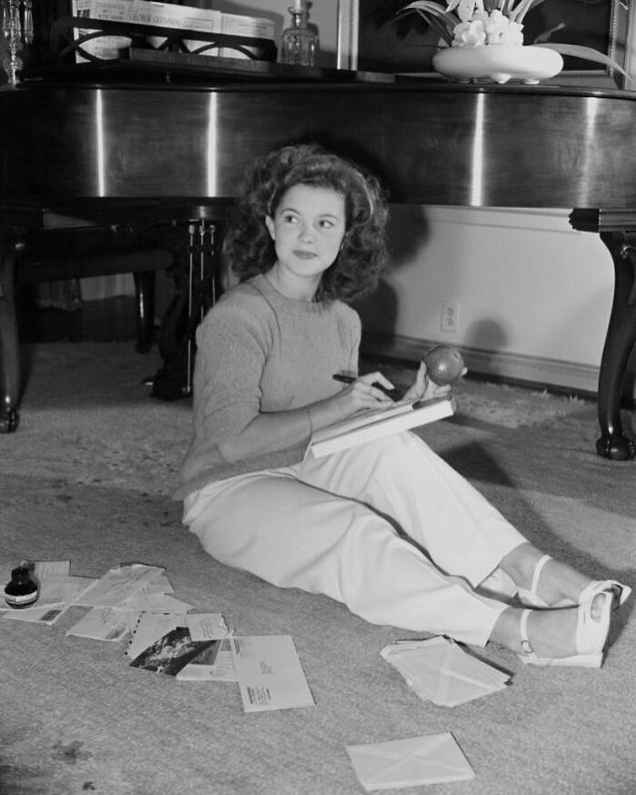Former Child Star, Shirley Temple Reading A Collection Of Fan Mail In The Living Room Of Her Los Angeles Home, 1944. Photos By Earl Theisen