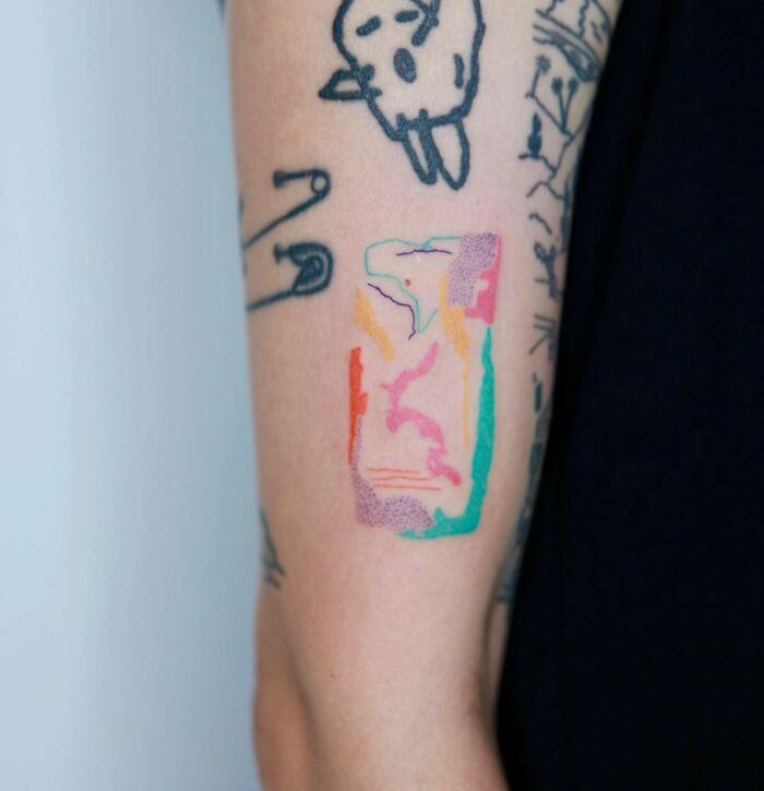 Abstract and colorful hand Tattoo 
