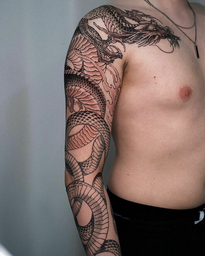 Snake arm tattoo made by London Tattoo Artist Gabriele Cardosi at Red Point  tattoo U.K - 9GAG