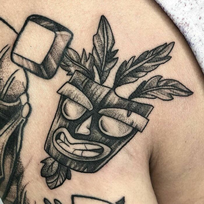 Aku Aku from Crash Bandicoot tattoo 