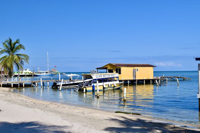 Boats And Buildings Over The Water In San Pedro, Belize