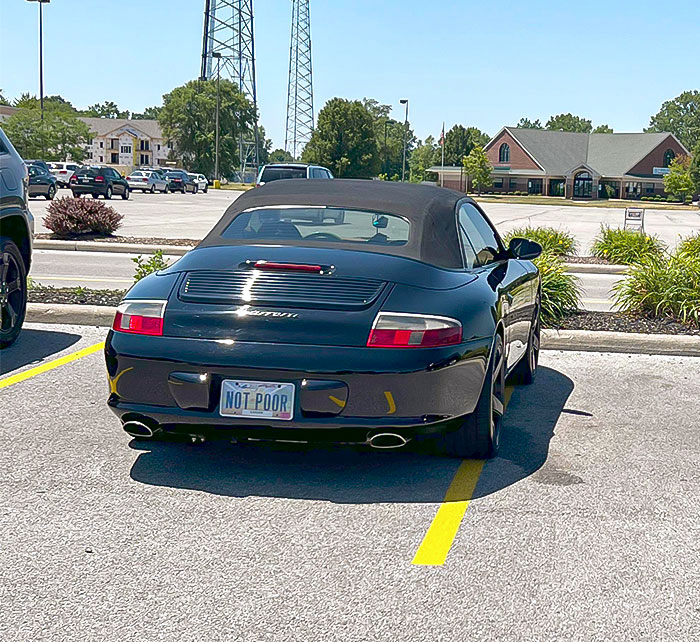 The Parking Job Was Pretty Bad And The "Not Poor" License Plate Was The Cherry On Top
