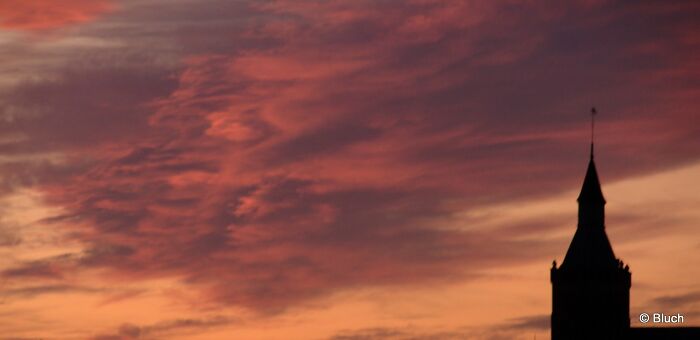 Church Tower At Sunset