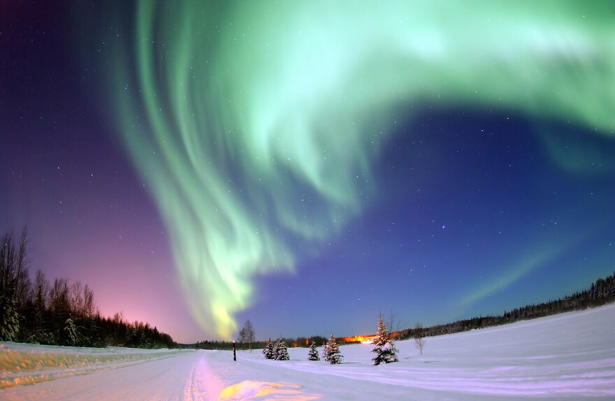 The Aurora Borealis, Or Northern Lights, Shines Above Bear Lake, Eielson Air Force Base, Alaska By Joshua Strang