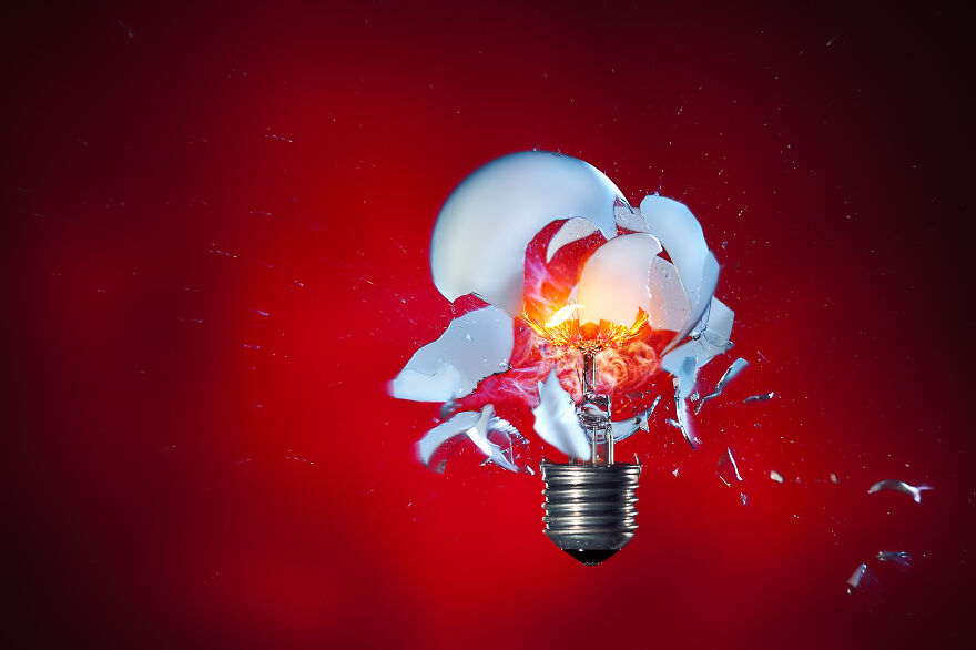 High-Speed Photography Of A Light Bulb Shot With An Airsoft Pistol (Positioned Right Of The Lamp) By
