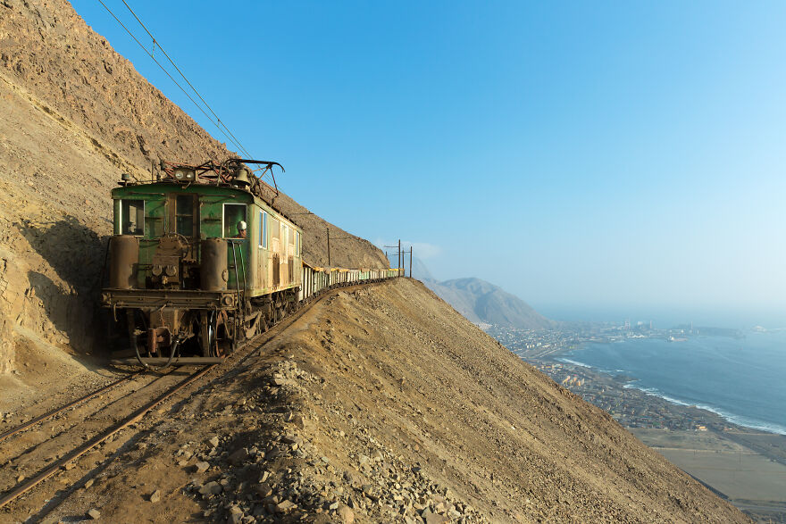 High Above Tocopilla, Chile, One Of Sqms Boxcabs Coasts Downhill To The Reverso Switchback By David Gubler