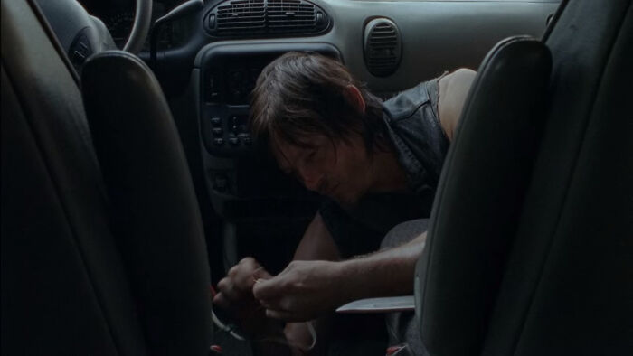 Daryl Dixon starting a car with wires 