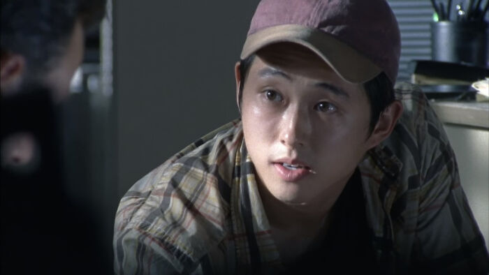 Glenn Rhee looking at Daryl Dixon 