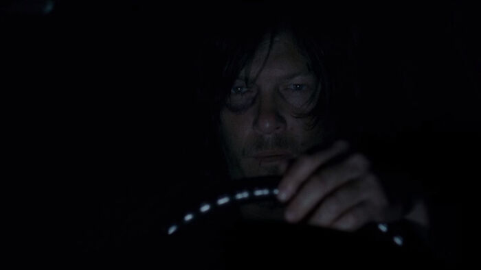 Daryl Dixon driving car in dark 
