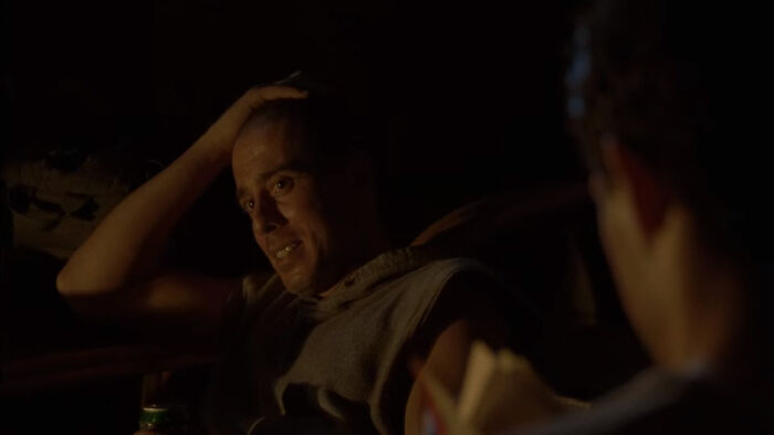 Mitch Dolgen sitting near a fire place 