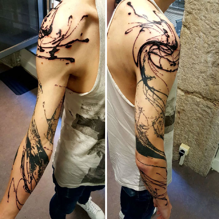 Abstract Shoulder and hand tattoo 