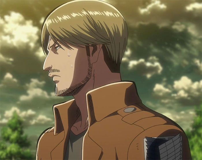 Miche Zacharius wearing brown jacket