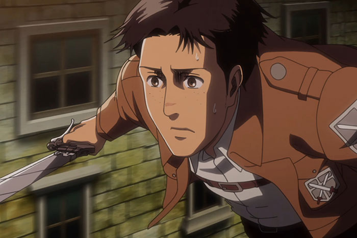 Marco Bott wearing brown jacket