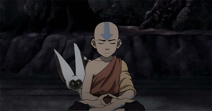 Aang with Momo and eyes closed