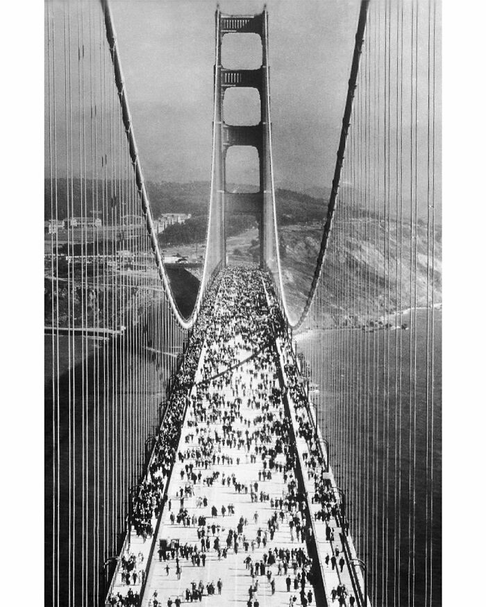 1937. Pedestrians Swarm Across Golden Gate Bridge Immediately After Its Opening