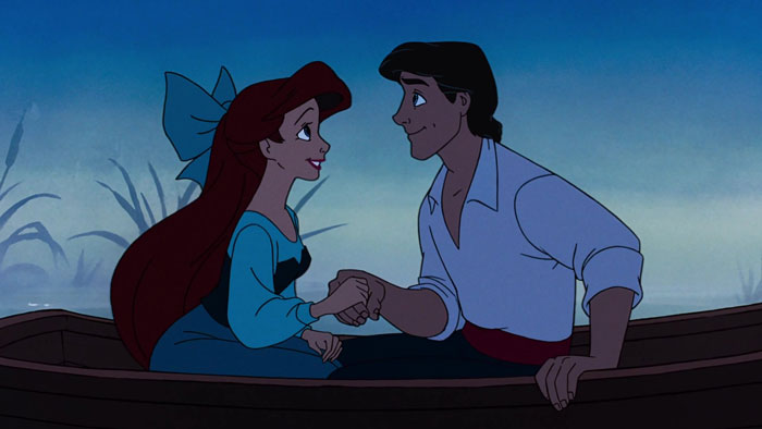 Ariel and Prince Eric sitting in a boat 