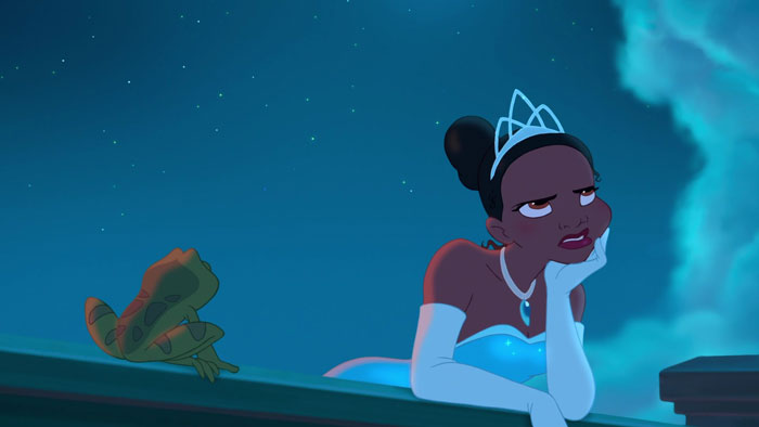 Tiana looking very disgusted with a frog