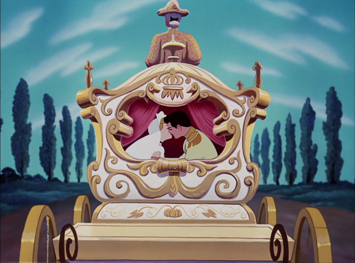 Cinderella and Prince Charming kissing in a carriage 