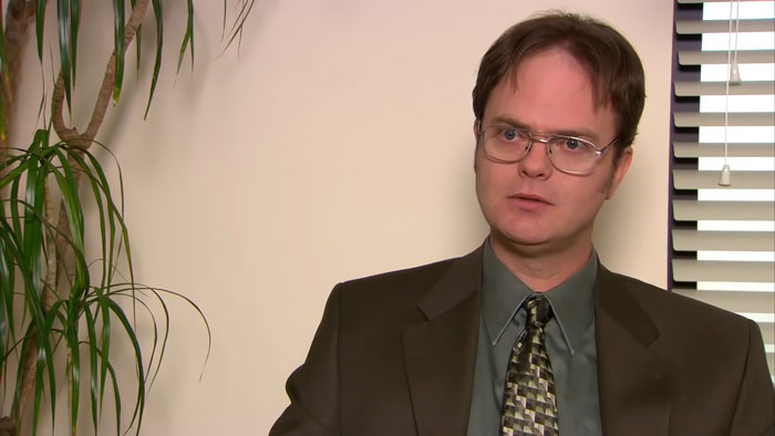 Dwight Schrute looking with an annoyed look