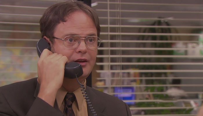 Dwight Schrute talking on the phone