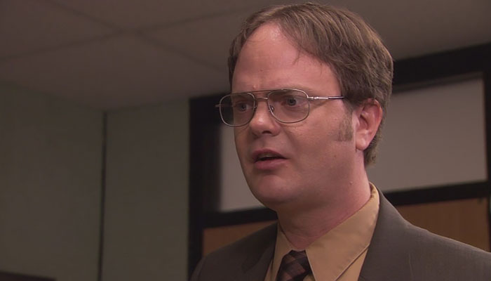 Dwight Schrute talking a littlle disappointed while talking 