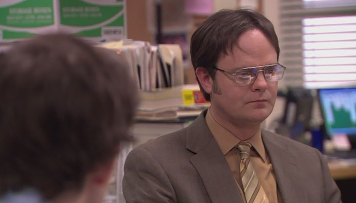Dwight Schrute looking down a little sad