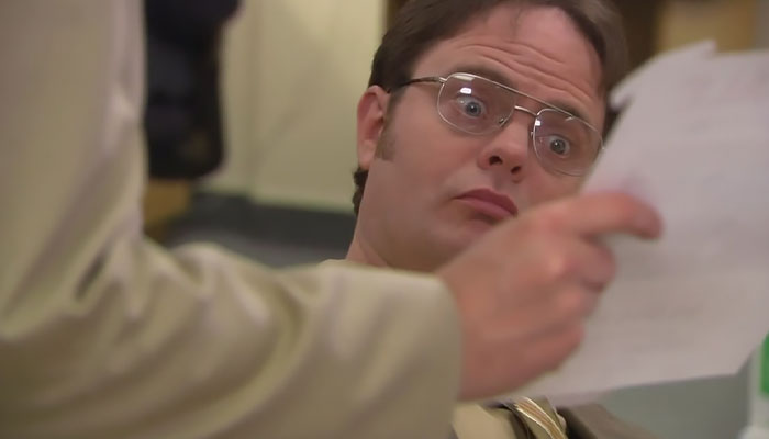 Dwight Schrute looking with a chocked expression