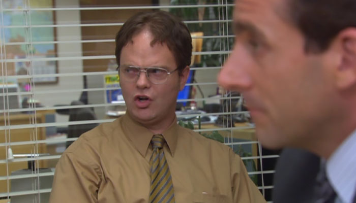 Dwight Schrute angrily talking and side-eyeing