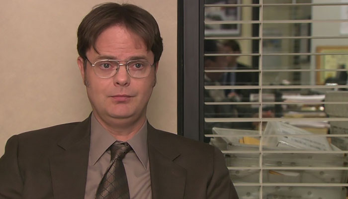 Dwight Schrute trying to convince the camera crew with his look 